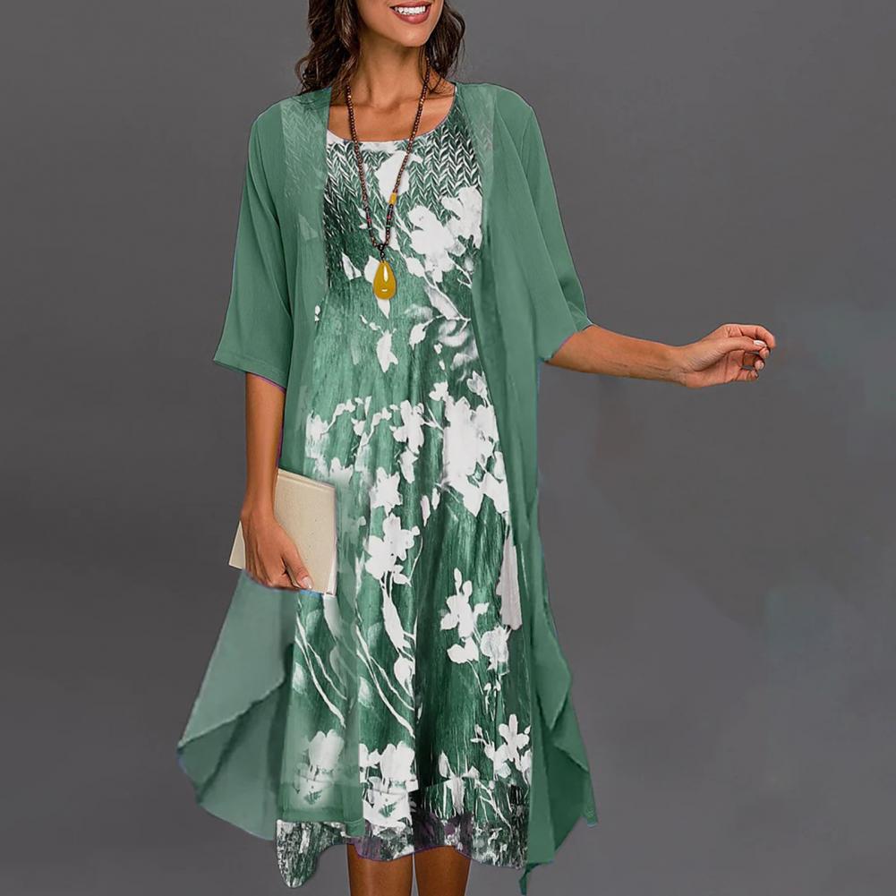 Elegantes Damenkleid-Set, grün, Blumenmuster, großer Saum, Cardigan, rundhals, modisch.