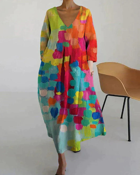 Buntes Damenkleid mit V-Ausschnitt, abstraktes Muster, lang, lässig, modisch, bequem.