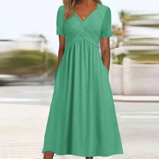 Damen Sommerkleid grün, knielang, V-Ausschnitt, kurze Ärmel, Freizeitmode, Baumwolle.